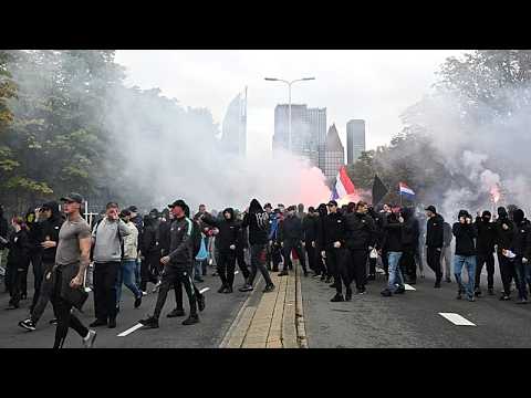Dutch police clash with hundreds of far-right protesters at anti-immigration rally