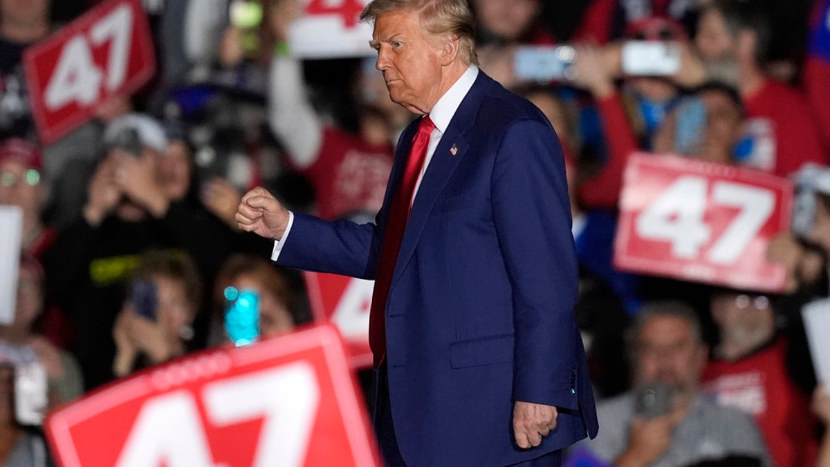 Former President Trump departs after speaking during a campaign rally at the Suburban Collection Showplace, Oct. 26, 2024, in Novi, Michigan.