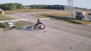 Helicopter spins out of control at Texas airport, crashes into parked plane: video