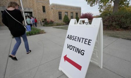 Wisconsin’s record high early in-person turnout causes voting delays