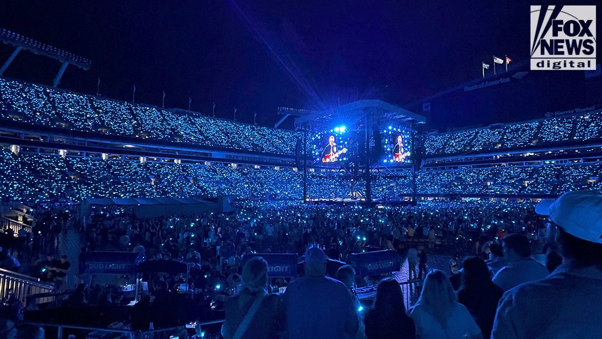 The stadium lit up during Eric Church's performance at the Concert for Carolina