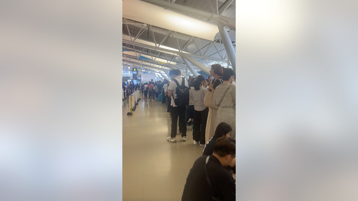 Jordyn and JT wait in line for 3 hours at airport