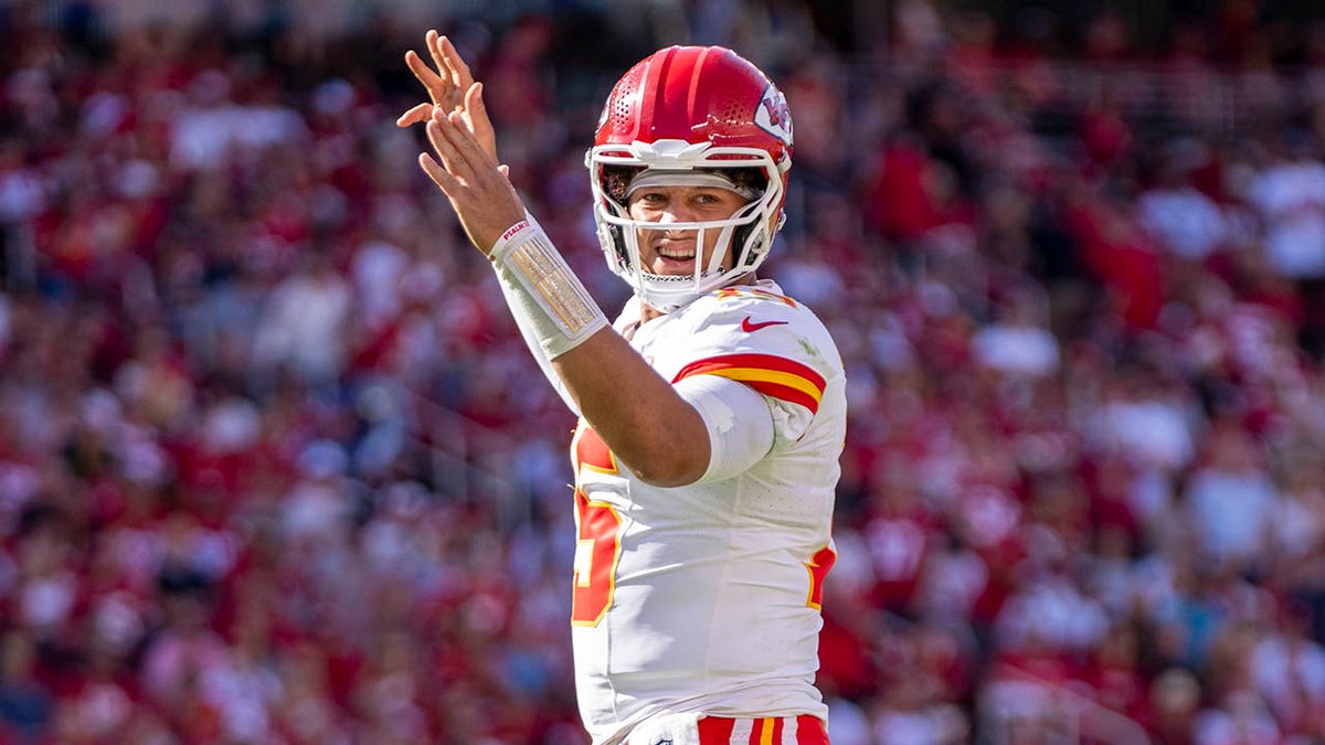 Patrick Mahomes signals for touchdown