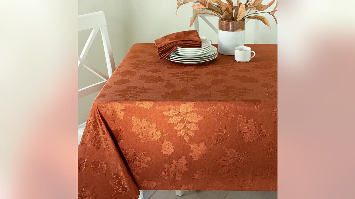 Cover your table with a beautiful holiday tablecloth. 