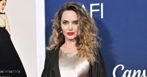 Angelina Jolie Stuns in Red Carpet Curls at Screening for Her New Film ‘Maria’