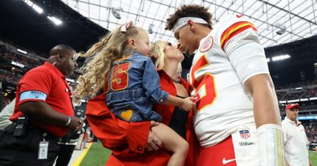 Pregnant Brittany Mahomes Is a Lady in Red in Chic Coat at Chiefs Away Game in Vegas