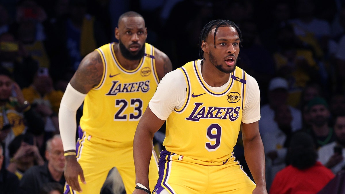 Bronny and LeBron on floor