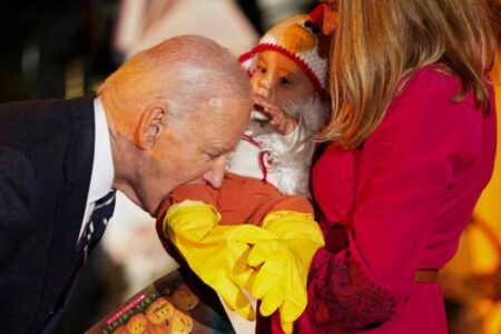 Biden, 81, bites baby dressed as chicken during WH Halloween event