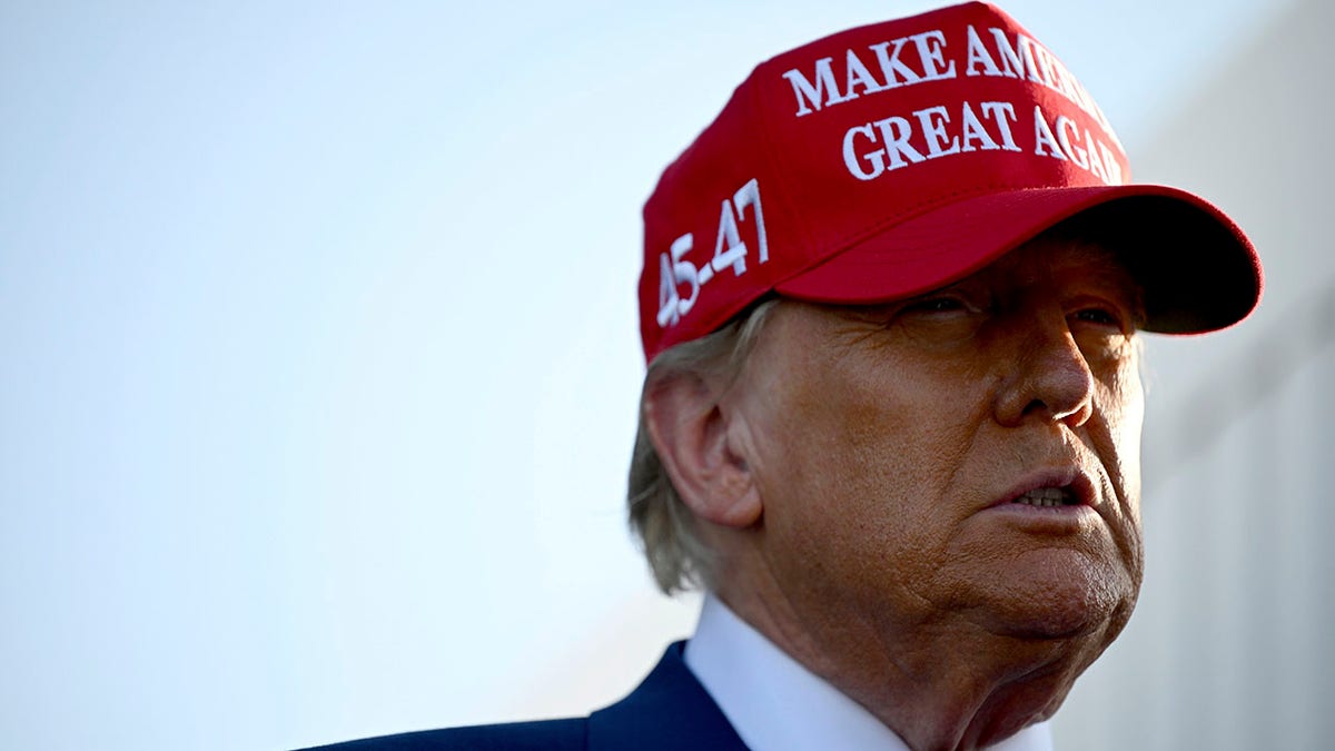 Trump in Texas with a MAGA cap