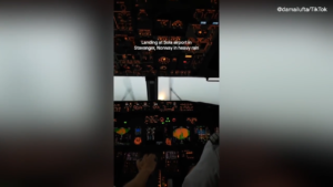 Flight attendant’s viral video shows pilots landing in heavy rainstorm