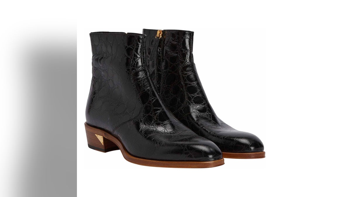 Pair these high-end leather boots with all your cocktail attire. 