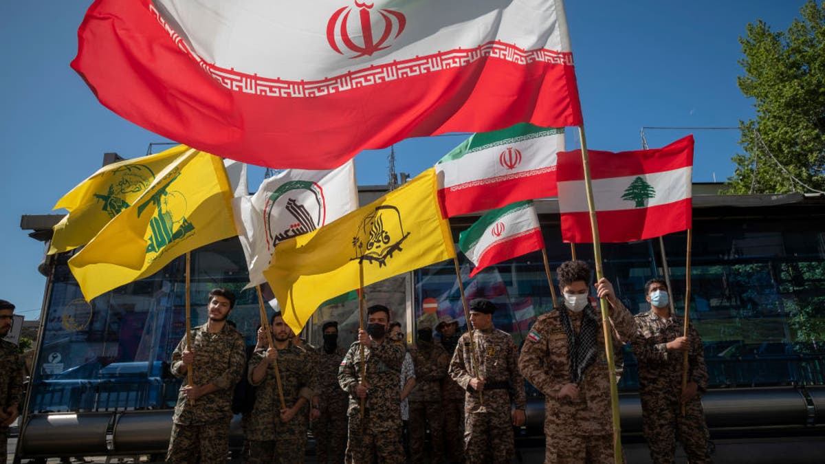 Members of the Basij paramilitary force are shown during a rally commemorating International Quds Day in downtown Tehran, Iran, on April 14, 2023.