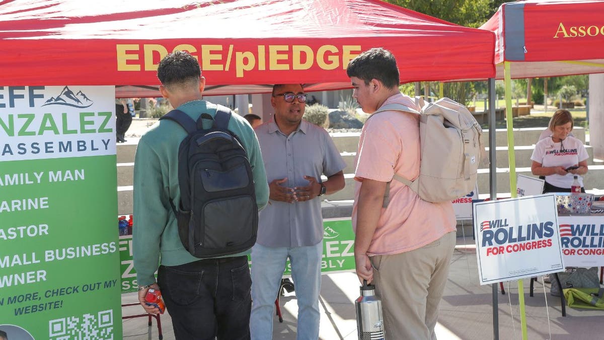 Jeff Gonzalez speaks with voters