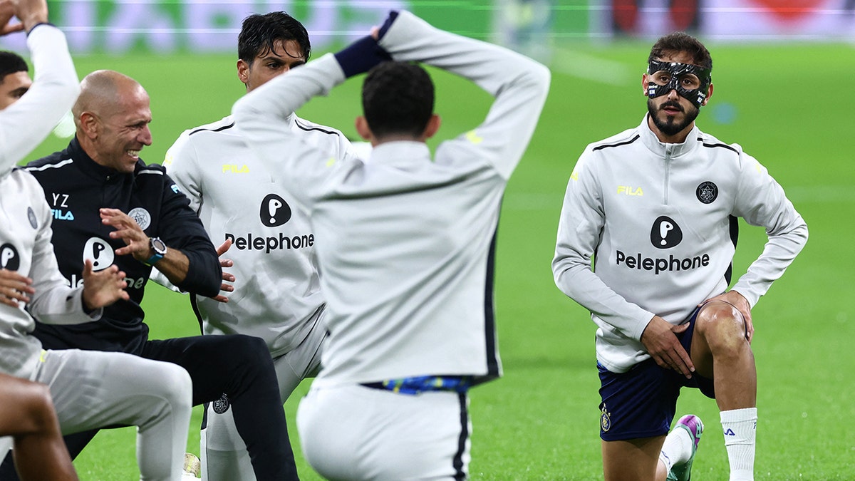 Maccabi players warm up