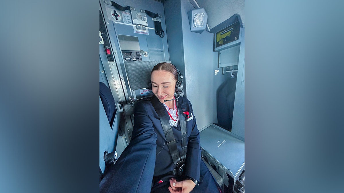 Mina Farmen Bertheussen poses for a photo while working as a flight attendant.