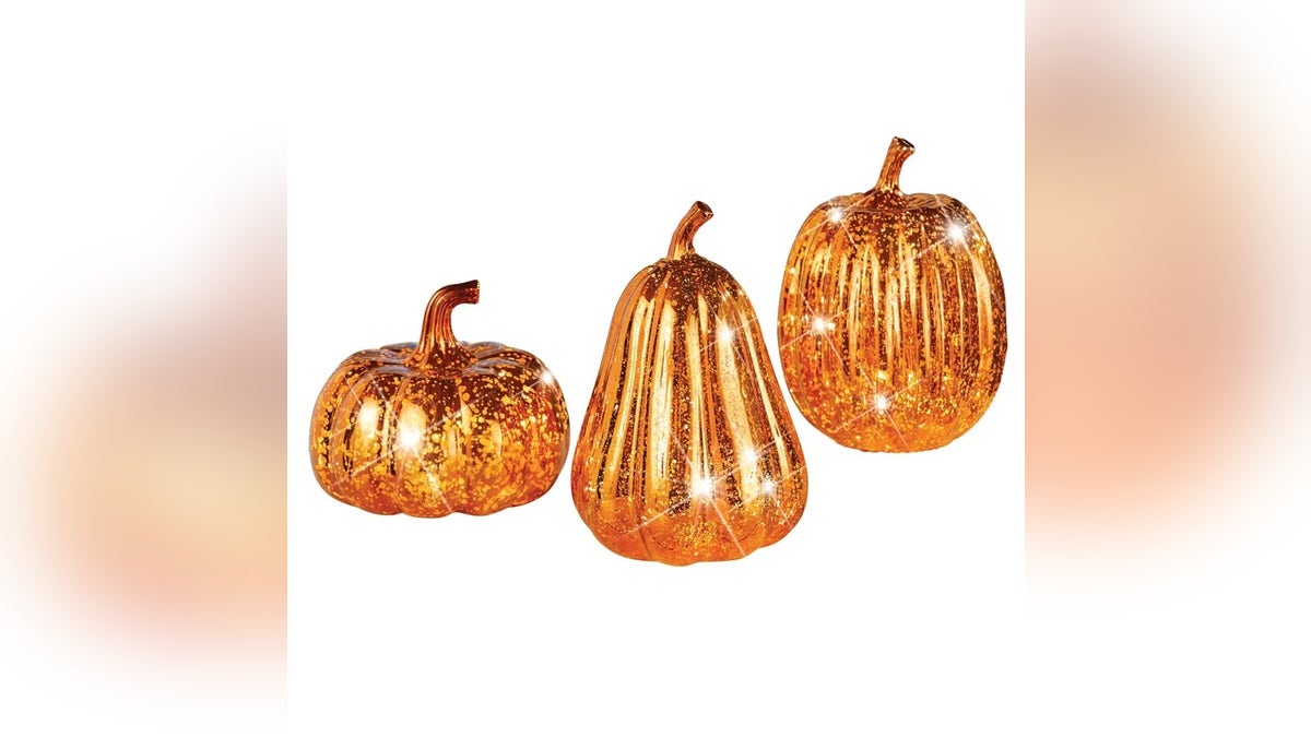 A light-up pumpkin and gourd set from Wayfair sets a warm, cozy tone in your kitchen as the perfect centerpiece.