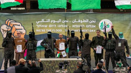 Hamas says it’s delaying next hostage release, claiming ceasefire violations