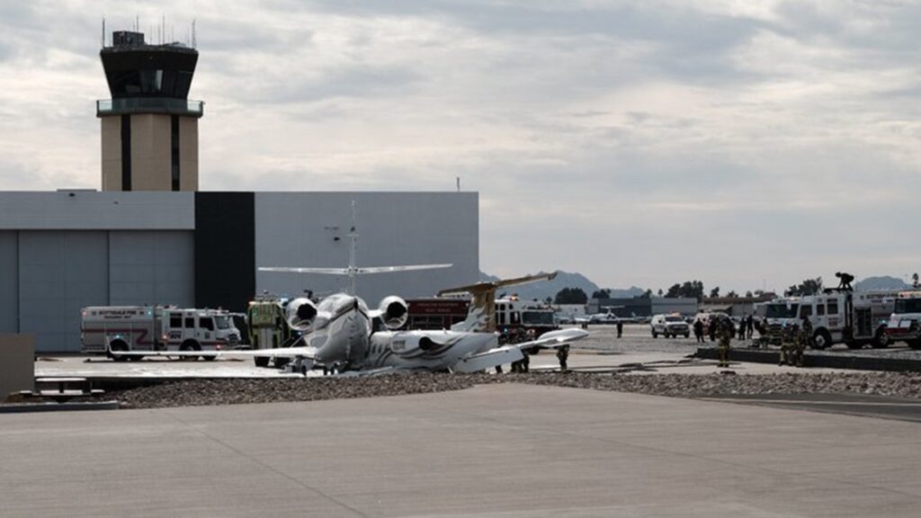 At least one dead after jet crashes into another plane at Scottsdale Airport in Arizona