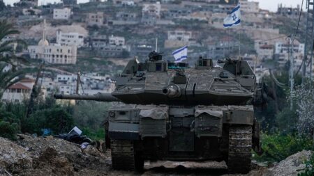 Israel moves tanks into West Bank for first time since 2002