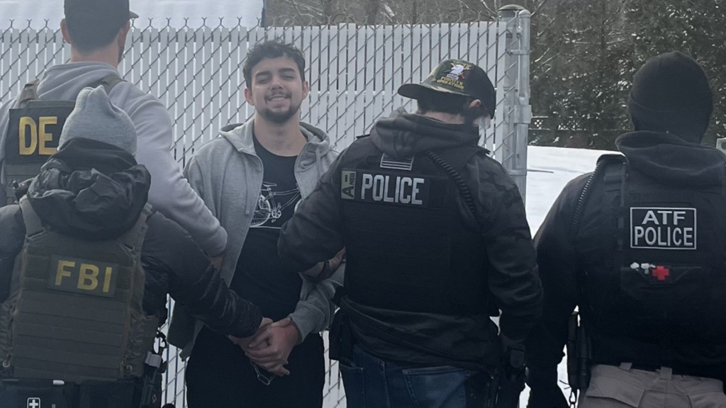 Illegal Brazilian gang member convicted of assault flashes sinister smile during arrest in Massachusetts