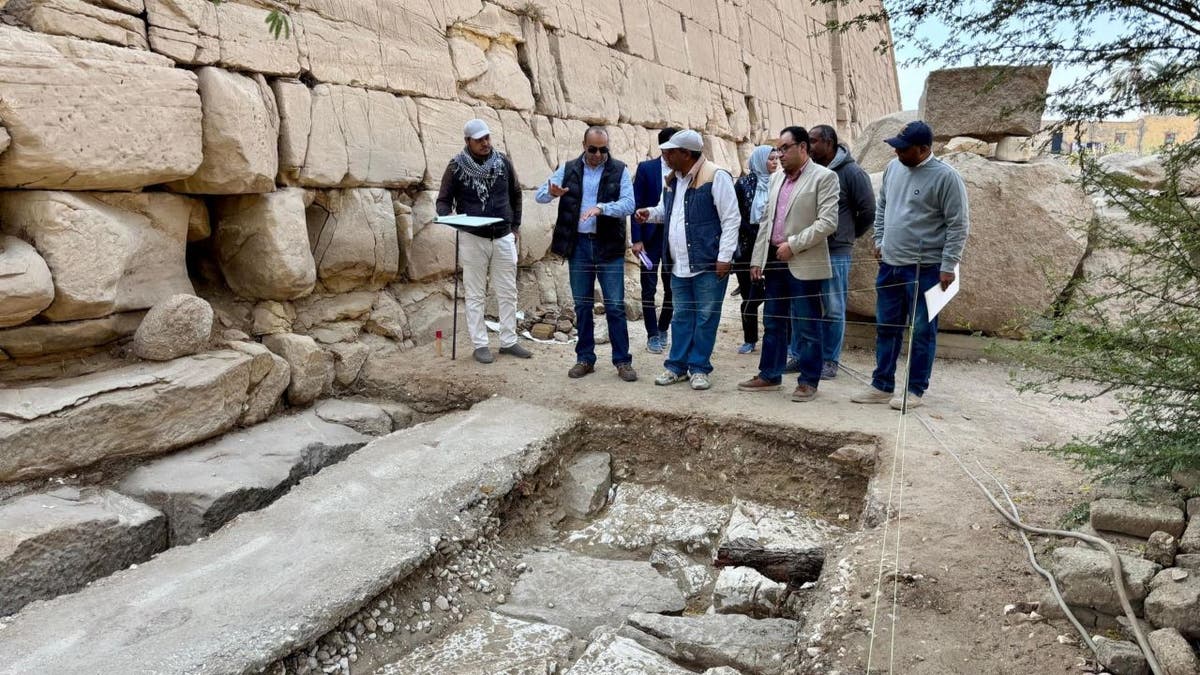 Group of men near ruins