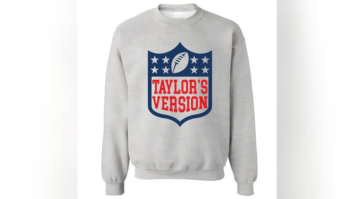 Bring the Eras Tour to the Super Bowl with this "Taylor's Version" sweatshirt. 