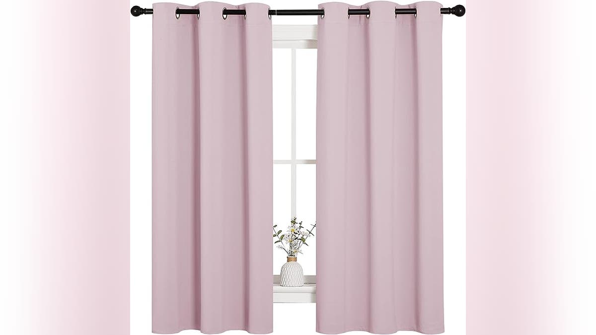 Keep it dark and cool in the room with these curtains.