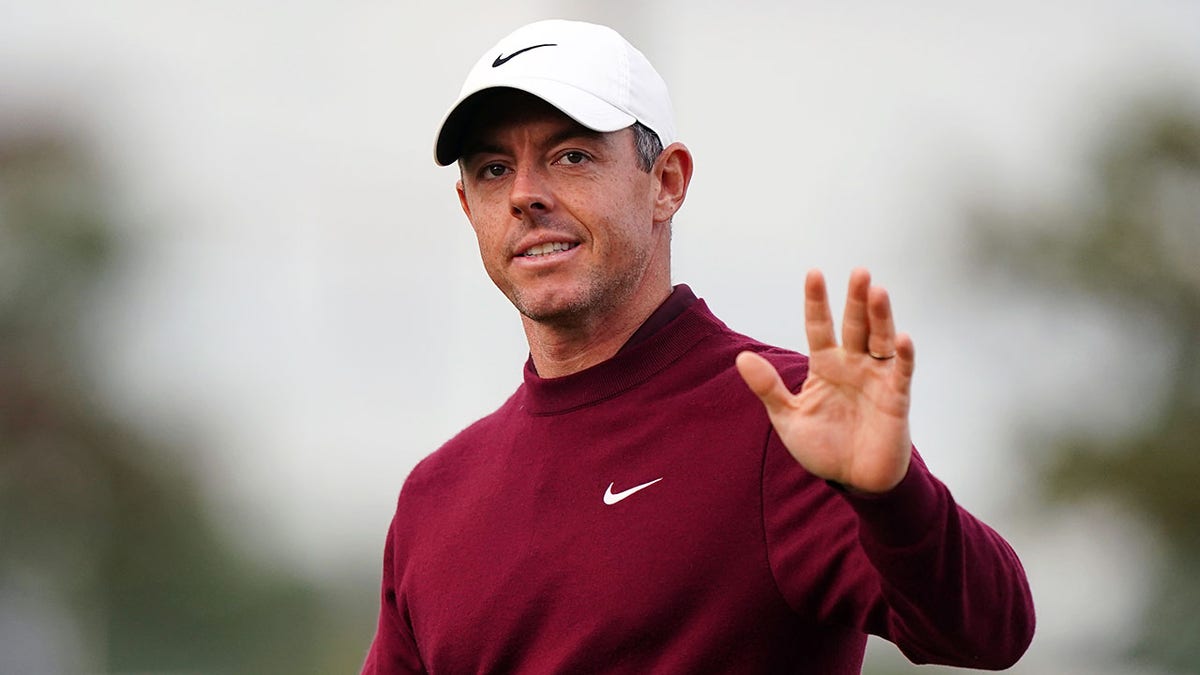 Rory McIlroy waves