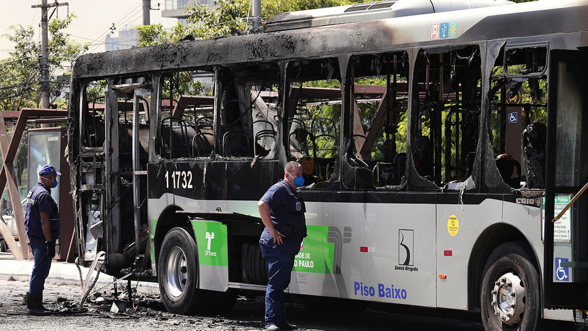 Bus catches fire following plane crash