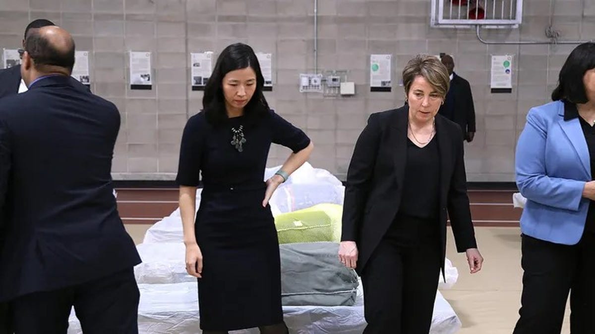 Boston Mayor Michelle Wu and Massachusetts Gov. Maura Healey visit the Melnea A. Cass Recreational Complex, which was being used to house more than 300 migrants.