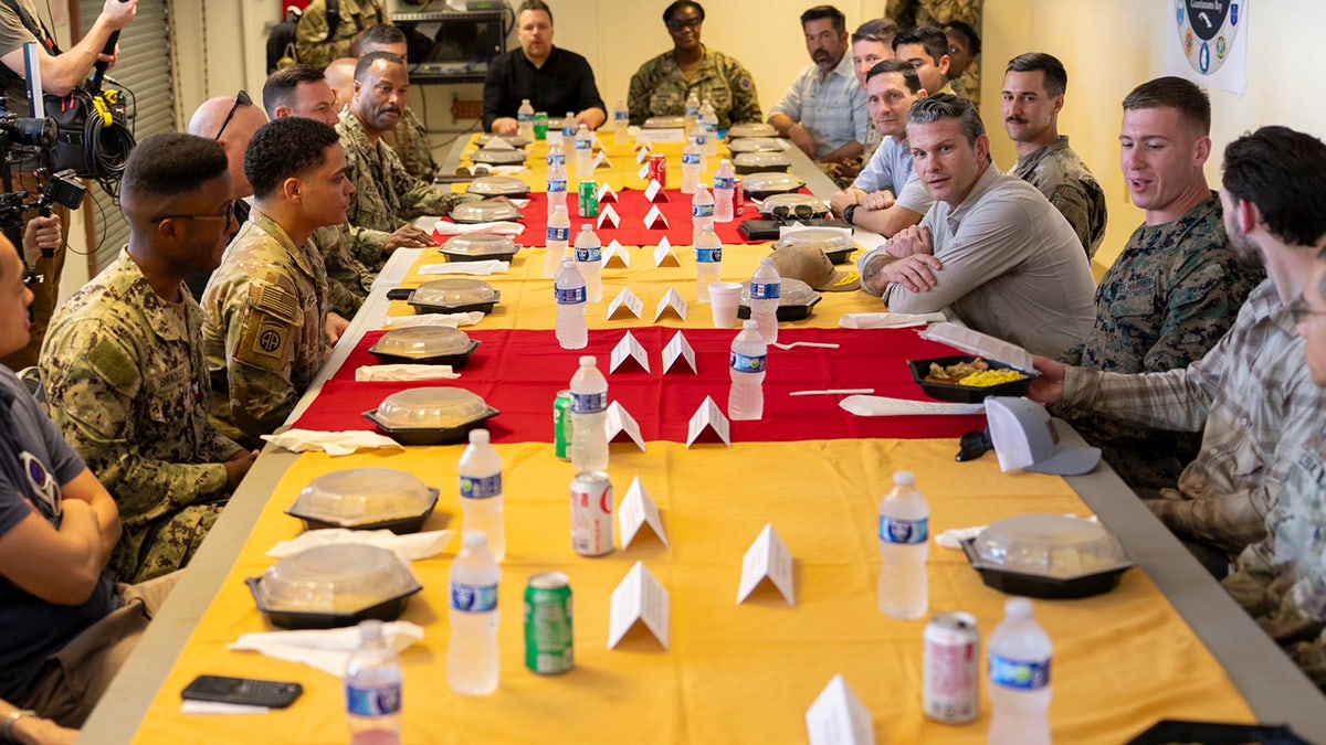 Defense Secretary Pete Hegseth seen greeting troops at Guantanamo Bay, Cuba. 