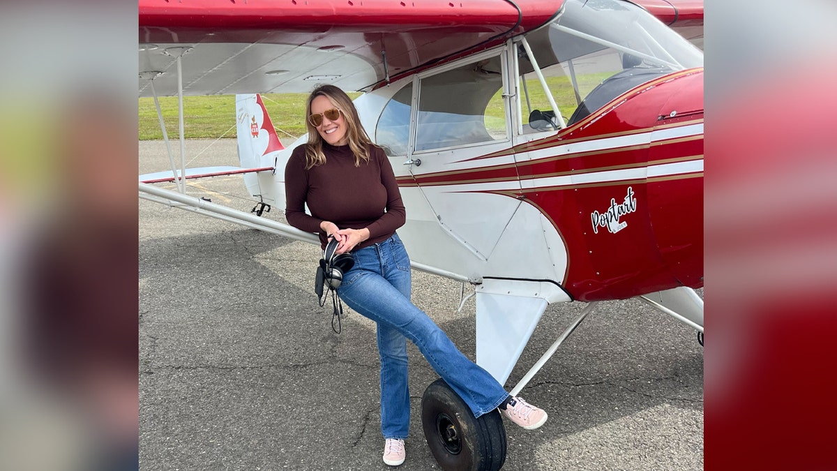 Dr. Michaela Johnson with the plane poptart