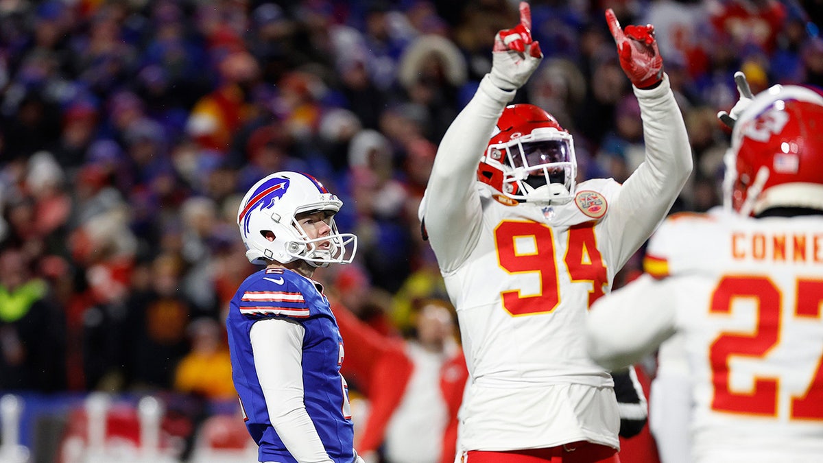 Tyler Bass reacts after missing field goal