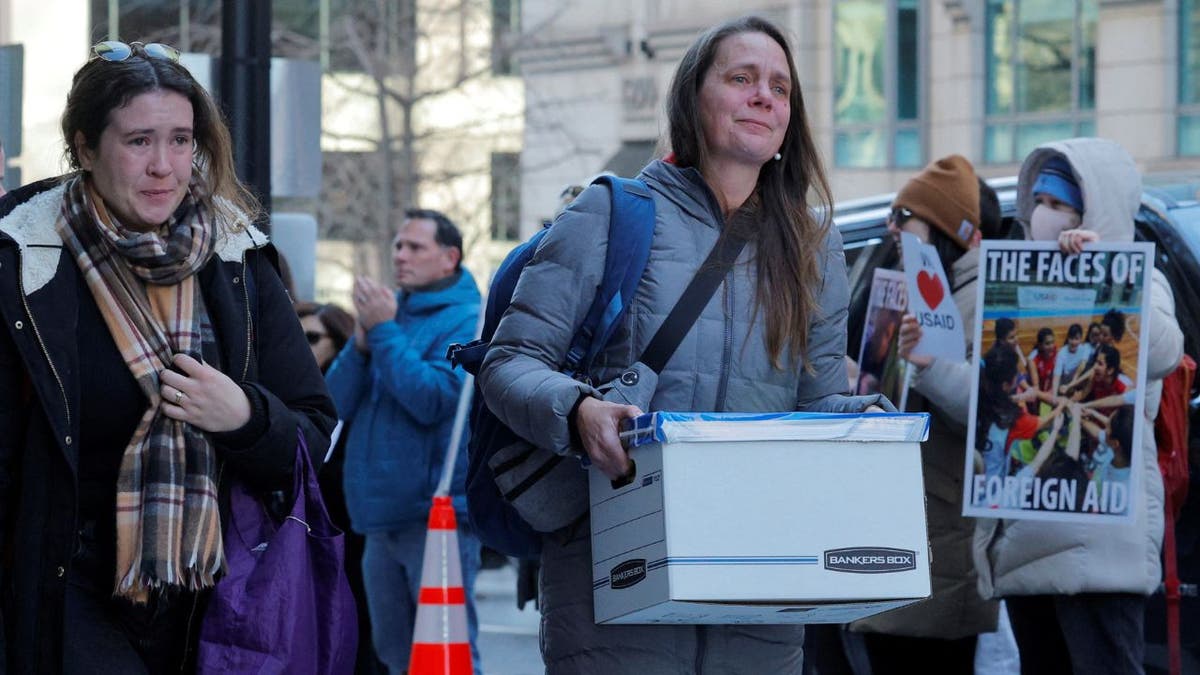 Tearful staffers leave USAID building in Washington D.C.