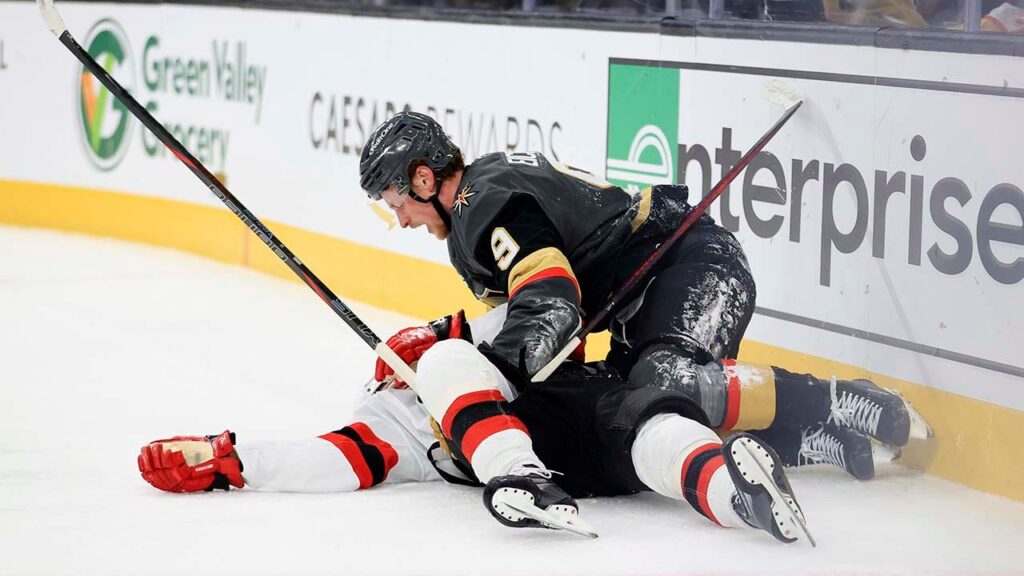 Devils’ Jack Hughes suffers gruesome shoulder injury after after crashing into boards