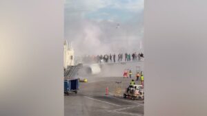 American Airlines flight catches fire in Denver