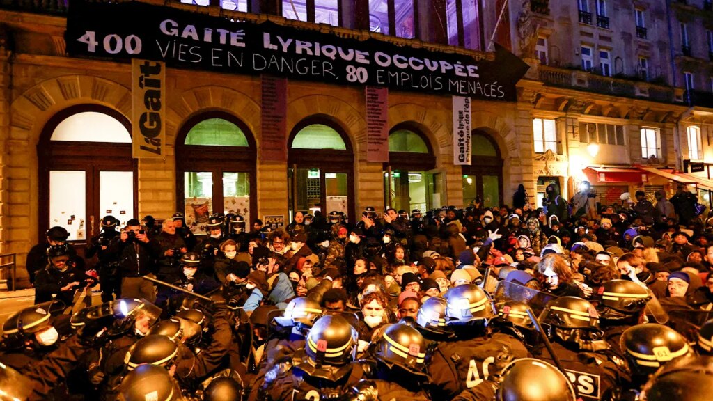 Hundreds of migrants evicted from Paris theater after squatting there for months