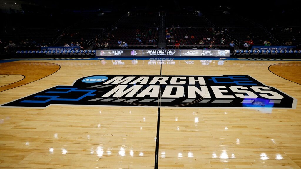 Tensions run high during March Madness game as fan throws water bottle on court