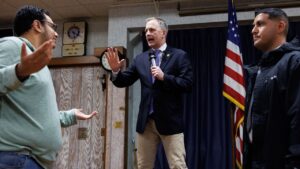 ‘Soulless piece of crap’: Angry protester jumps on stage during Dem rep’s town hall