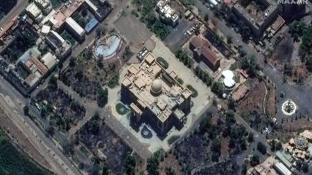 Sudanese army surrounds Khartoum airport in battle for capital, military sources say