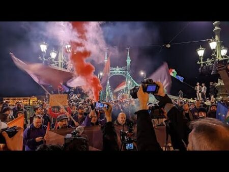 Demonstrators block traffic in Budapest in opposition to new law banning LGBTQ+ Pride events