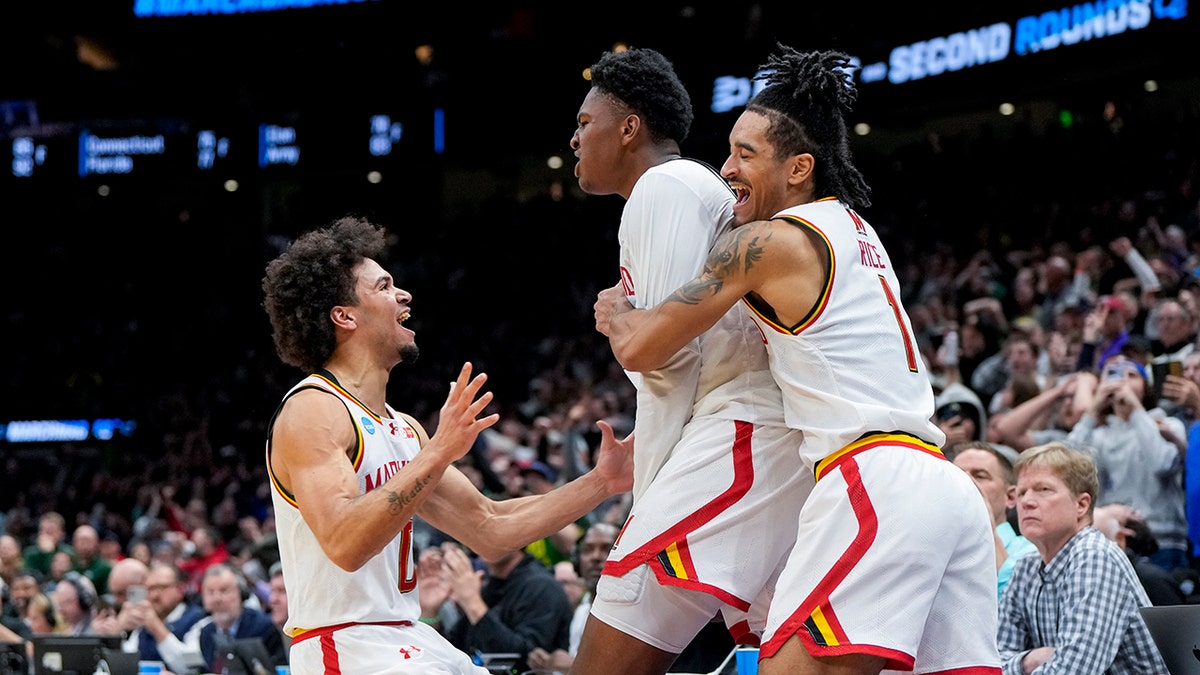 Derik Queen celebrates buzzer beater