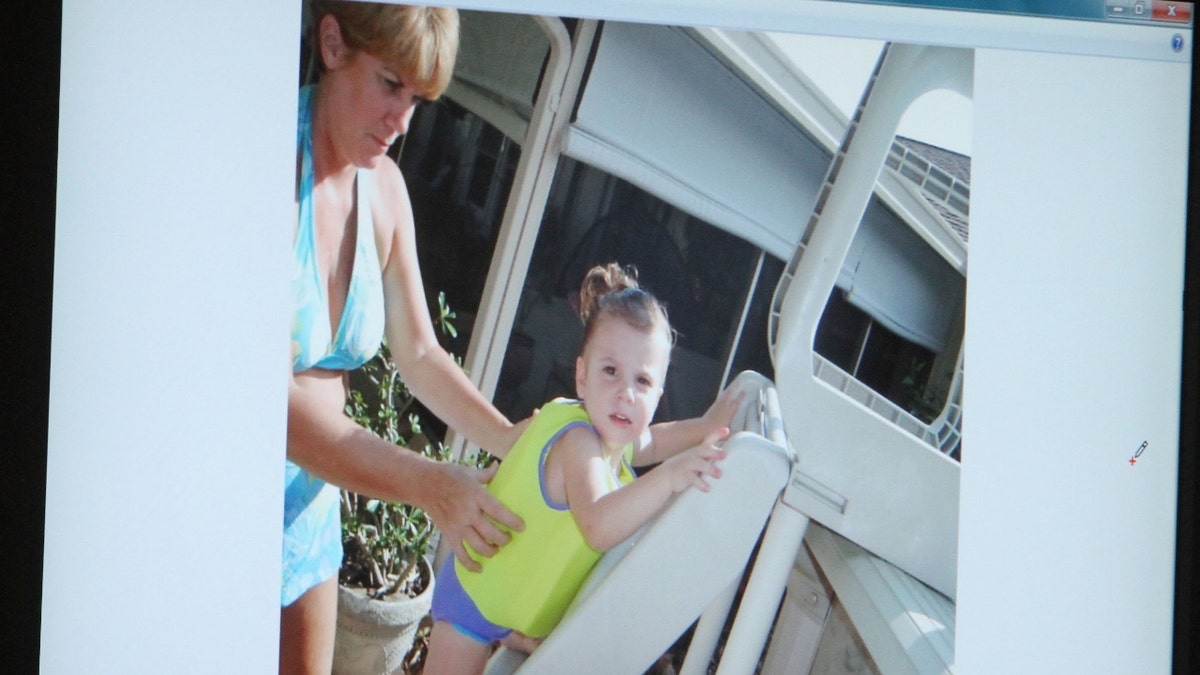 An image of Cindy Anthony, left, and Caylee projected on a courtroom monitor is submitted into evidence in the Casey Anthony murder trial at the Orange County Courthouse in Orlando, Florida, Friday, June 24, 2011.