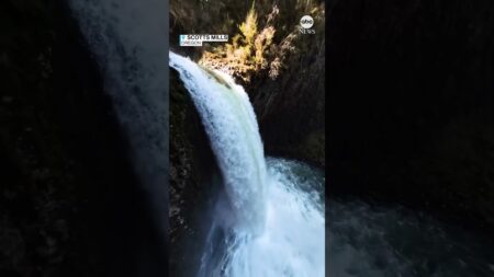 Extreme kayaker plunges nearly 100ft down waterfall