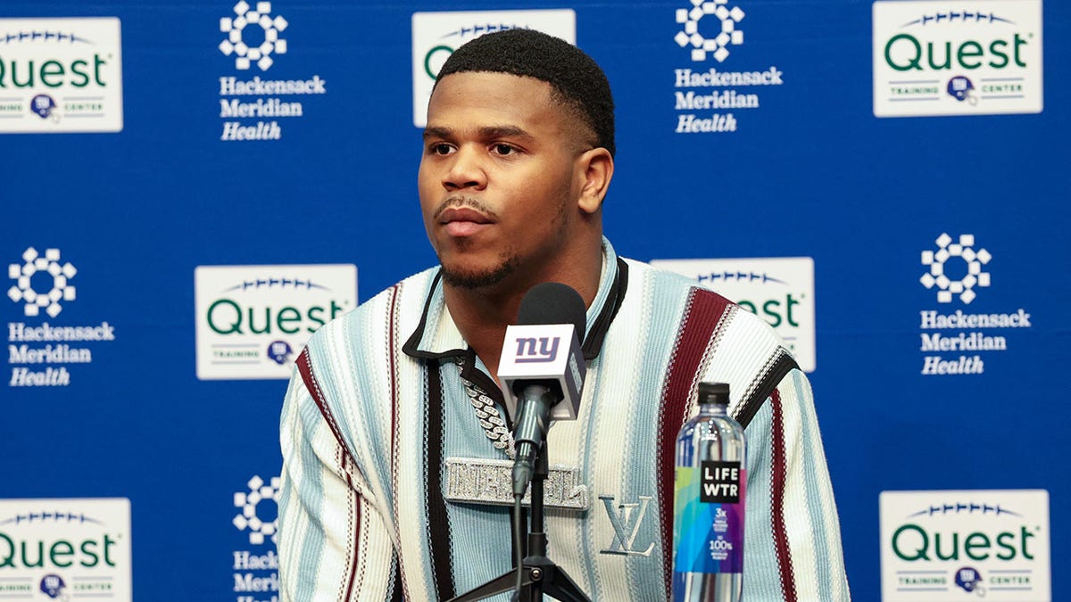 Abdul Carter speaks to reporters