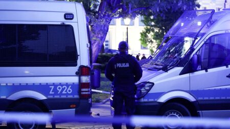 Ax attack at university leaves 1 dead, 1 injured as police reportedly find severed head at scene