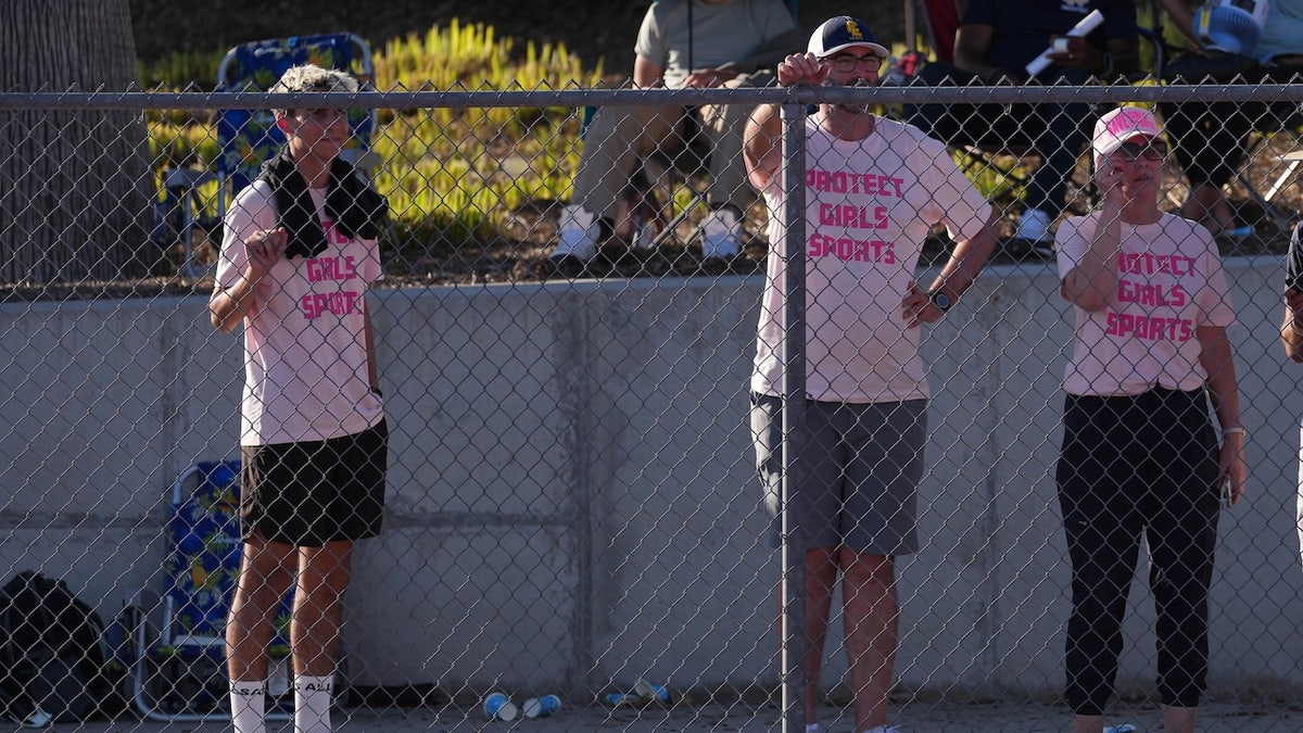 Spectators wear Protect Girls Sports shirts during the CIF Southern Section Division 3 Track and Field preliminaries at Nathan Shapell Memorial Stadium at Yorba Linda High School on May 10, 2025, in Yorba Linda, Calif.