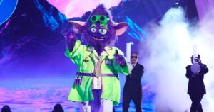The Masked Singer’s Mad Scientist Monster Reacts to Trace Adkins and Ronnie Dunn Comparisons (Exclusive)