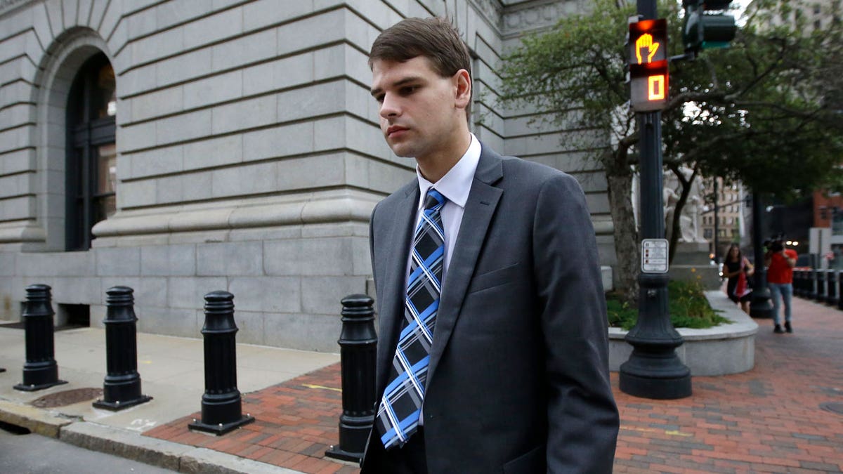 Missing Boater walking outside of court.
