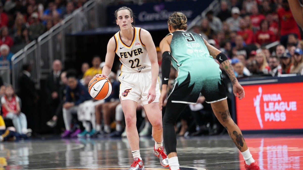 Caitlin Clark of the Indiana Fever dribbles the ball during the game against the New York Liberty on May 24, 2025 at Gainbridge Fieldhouse in Indianapolis, Indiana.